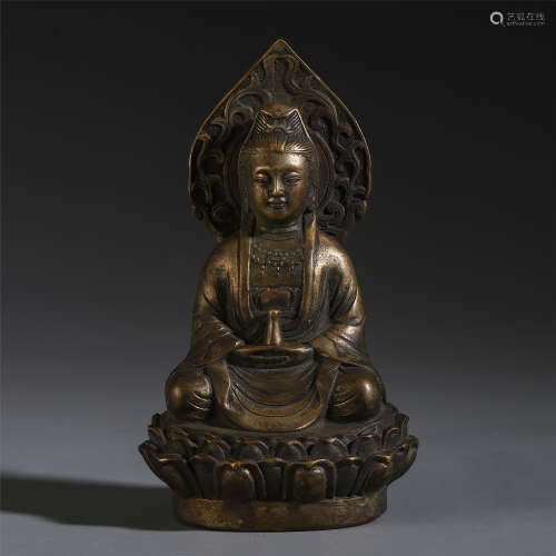 AN ANCIENT CHINESE BRONZE SEATED GUANYIN WITH LOTUS