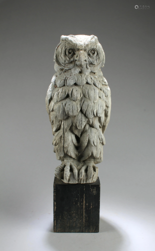 A Carved Standing Owl Figurine