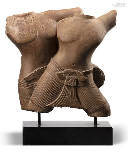 A CONJOINED PINK SANDSTONE CARVING OF A COUPLE, KHMER-ANGKOR PERIOD, 10TH CENTURY OR LATER