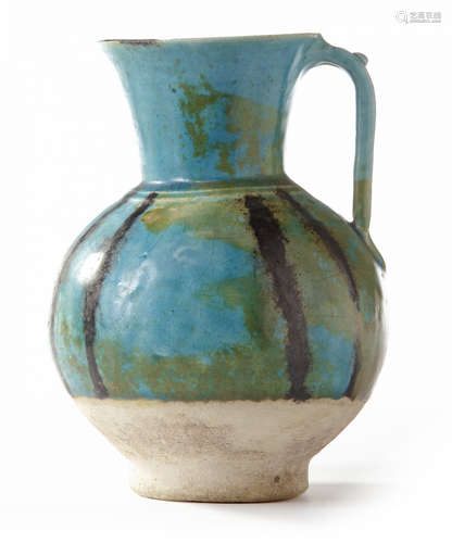 A RAQQA WARE VESSEL, SYRIA, FIRST HALF 13TH CENTURY