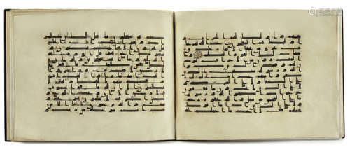 A BOUND GROUP OF TWENTY-NINE LEAVES FROM SEVEN SURAHS OF A DISPERSED MANUSCRIPT OF THE QURAN WRITTEN