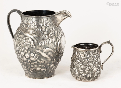 Two Sterling Repoussé Pitchers