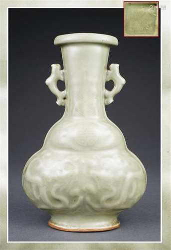 PORCELAIN GRES VASE MOULDED IN THE IMITATION OF A …