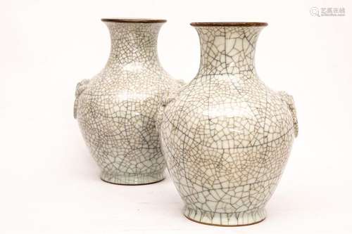 PAIR OF PORCELAIN VASES CRACKED IN THE SHAPE OF A …