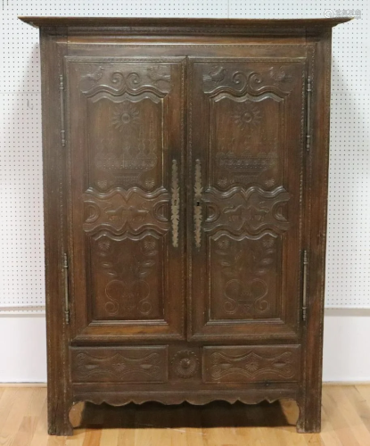 Antique Carved Continental Armoire .