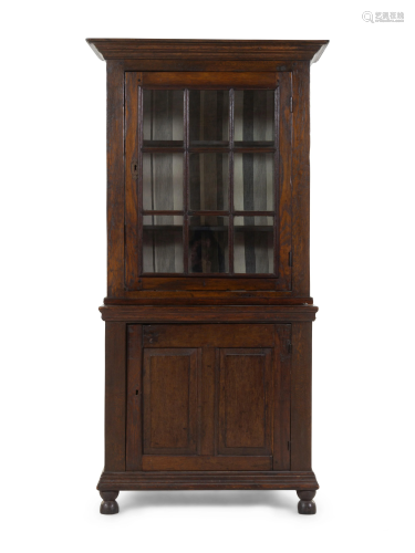 A French Provincial Step-Back Cupboard