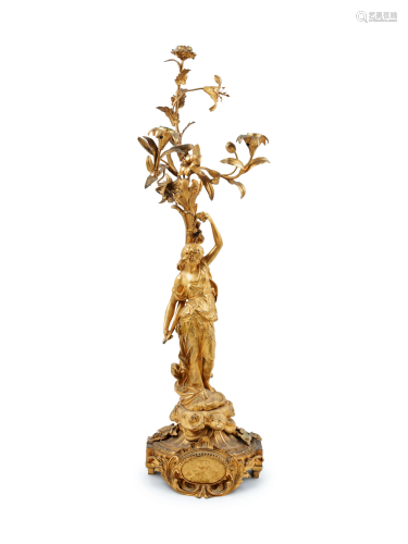 A Neoclassical Gilt Bronze Figural Candelabrum