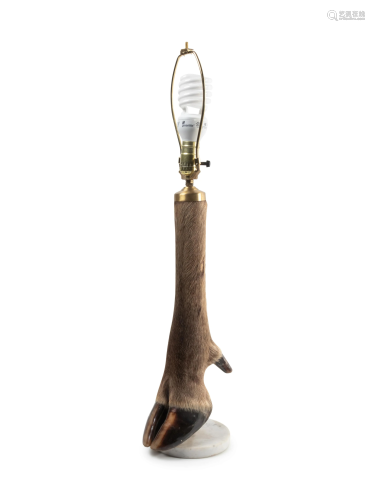 A Taxidermy Deer Leg Table Lamp