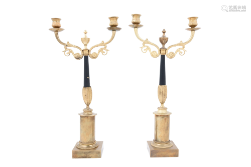 A Pair of French Gilt and Patinated Bronze Two-…