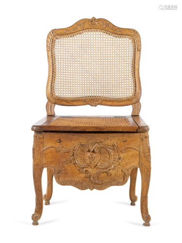 A Louis XV Provincial Carved Fruitwood Commo…