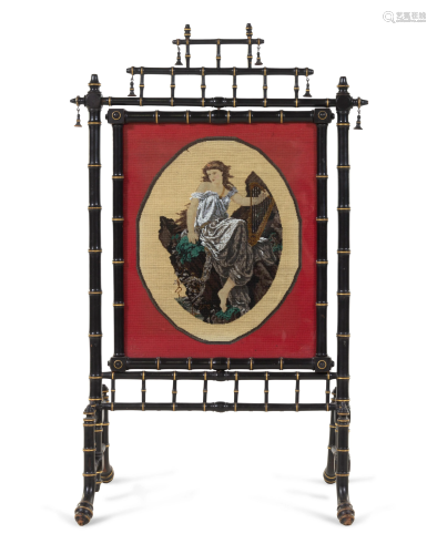 A Victorian Ebonized and Parcel Gilt Fire Screen