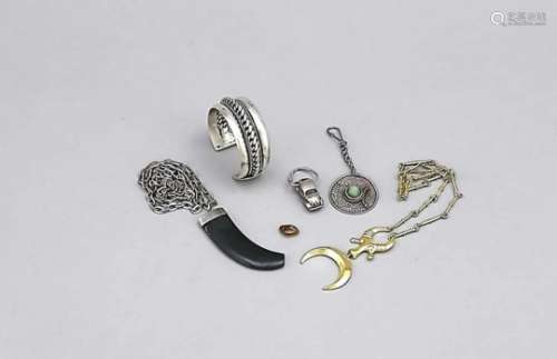 Compilation of costume jewelery, 20th cent., partly silver, partly with stones, bangle,chains with