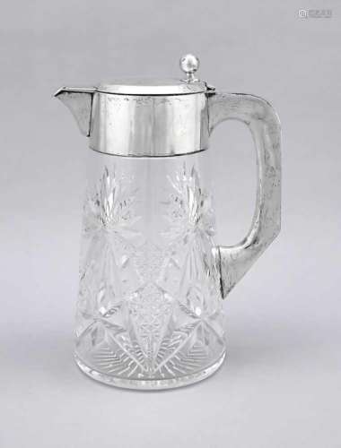 Large juice jug with silver mounting, German, 20th cent., silver 800/000, body clear glasswith