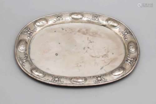 Oval tray, 19th century, silver tested, rim with relief decoration, floral motifs andarchitectural
