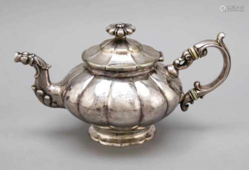 Teapot, around 1900, silver teszed, on a flower-shaped stand, bulgy body, sidely attachedcurved