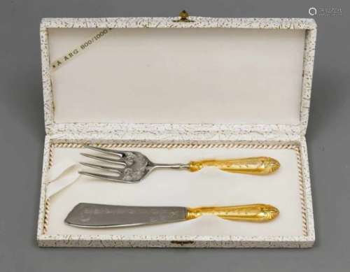 Two-piece fish serving cutlery, 20th century, silver 800/000, partly gilded, filledhandles with