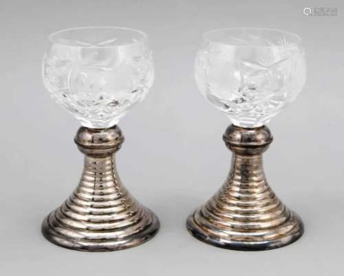 A pair of wine goblets with a silver foot mounting, German, 1st half of the 20th century,