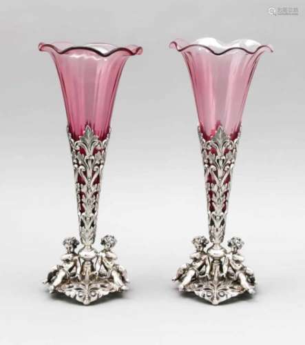 A pair of vases with mounting, 20th century, plated, 6-sided stand, set with 2 putti,conical body,