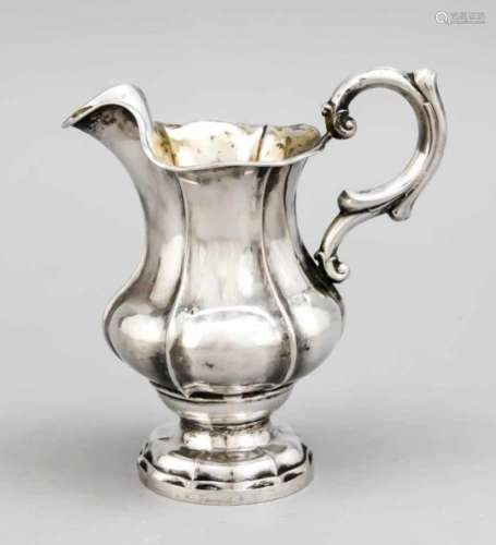Creamer, mid-19th century, silver tested, round stand, bulgy body, sidely attached, curvedhandle,