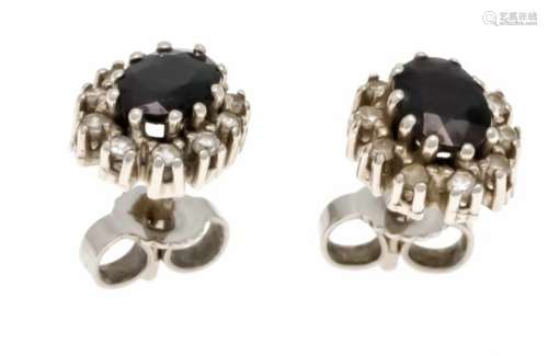 Sapphire diamond stud earrings WG 585/000 with 2 oval fac. Sapphires 6 x 4.5 mm and 20diamonds,