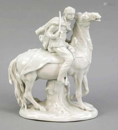 Riding hussar, 20th century, white, on oval natural base, rest., H. 25 cmReitender Husar, 20. Jh.,