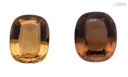 2 smoky quartz, 31.56 and 26.63 ct, oval staircase cuts, 23.0 x 19.2 x 11.3 mm and 22.3 x17.9 x 10.0