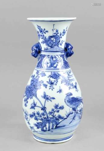 Blue and white vase, China, 19th/20th cent. Bulbous body with two applications in the formof heads
