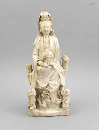 Blanc-de-Chine Guanyin, China, around 1900 or earlier? Creamy white glaze with craquelé.The child on