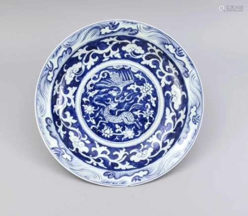 Large plate, China, 20th cent. Cobalt blue mirrored decoration with phoenix and anotheranimal and
