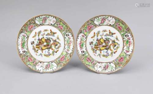 Pair of famille rose plates, China (Canton), 19th cent. In the mirror a colourfulbutterfly swarm