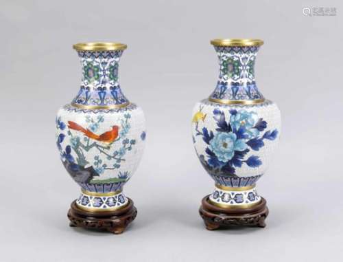 Pair of cloisonné vases, China, 20th cent. Decoration with birds between flowers and twigsagainst