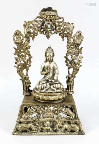 Buddha, 1st half of the 20th century, bronze / cast metal. Sitting on the lotus throne,openwork base