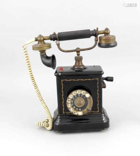 A historic telephone, Sweden around 1930, black polished metal-sheet case, bakelitereceiver,
