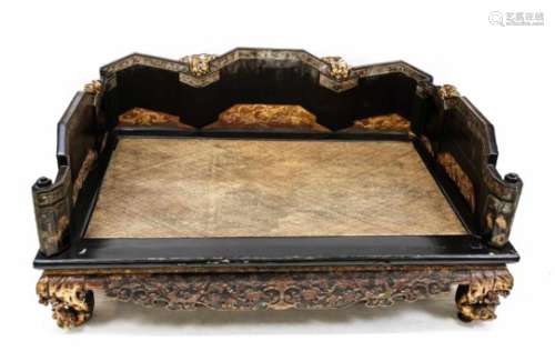 Kang Bed, China, 19th C. Hardwood body covered with black Chinese lacquer. Three-sideddrop side