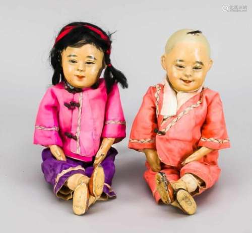 2 Puppen, China, um 1900, Pappmaché, polychrom staffiert. 1 x Junge, 1 x Mädchen. Inbunten