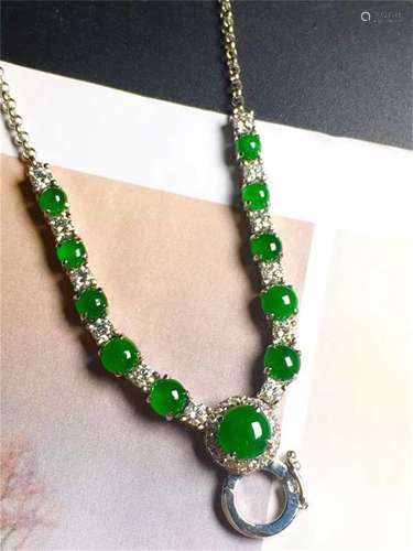 A Chinese Carved Jadeite Necklace