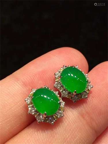 A Pair of Chinese Carved Jadeite Earrings