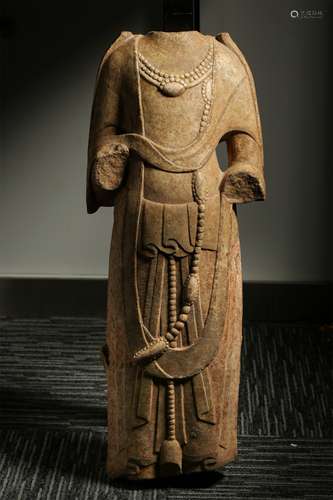 A Chinese Carved Stone Buddha Body