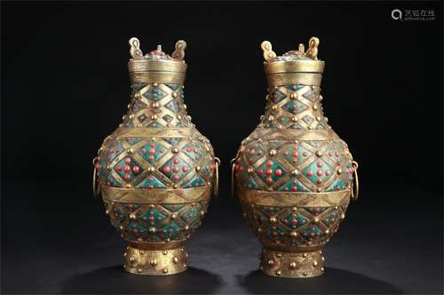 A Pair of Chinese Gilt Bronze Vases with Cover