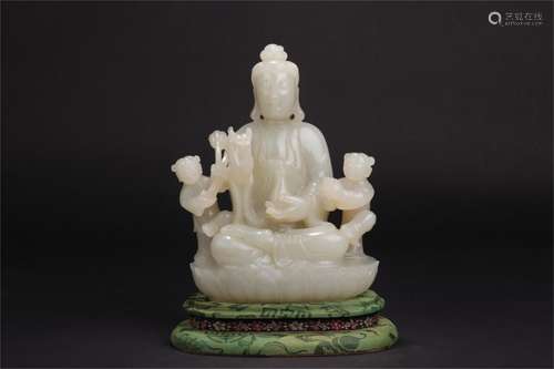 A Chinese Carved Jade Figure of Buddha