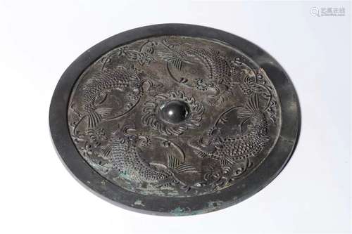 A Chinese Bronze Mirror