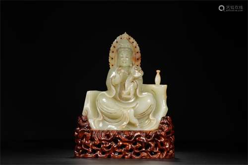 A Chinese Carved Jade Figure of Buddha