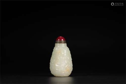 A Chinese Carved Jade Snuff Bottle