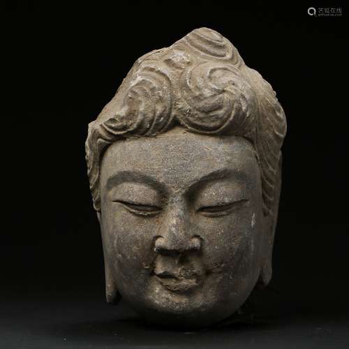 A Chinese Carved Stone Buddha Top