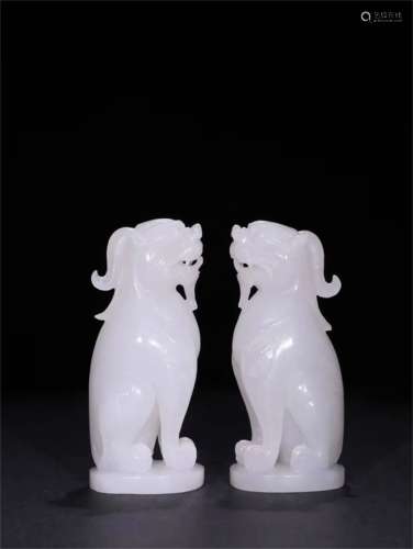 A Pair of Chinese Carved Jade Decorations