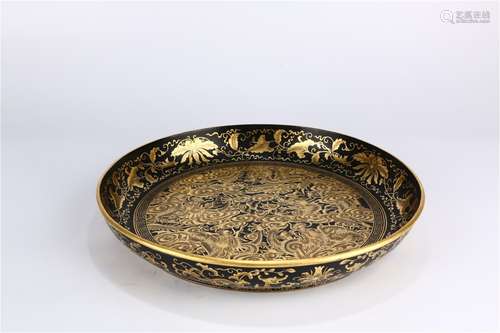 A Chinese Carved Lacquer Plate