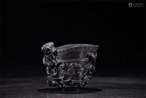 A Chinese Carved Hardwood Wine Cup