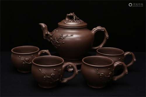 A Chinese Carved Yixing Clay Teapot