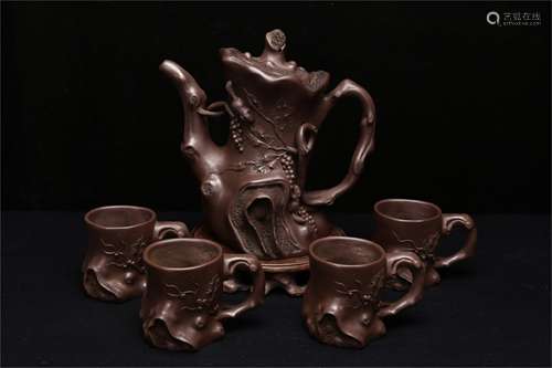 A Chinese Carved Yixing Clay Teapot