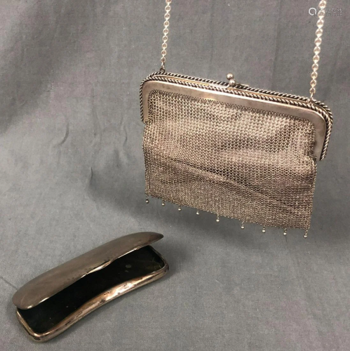 Silver. Lined evening bag and a glasses case.